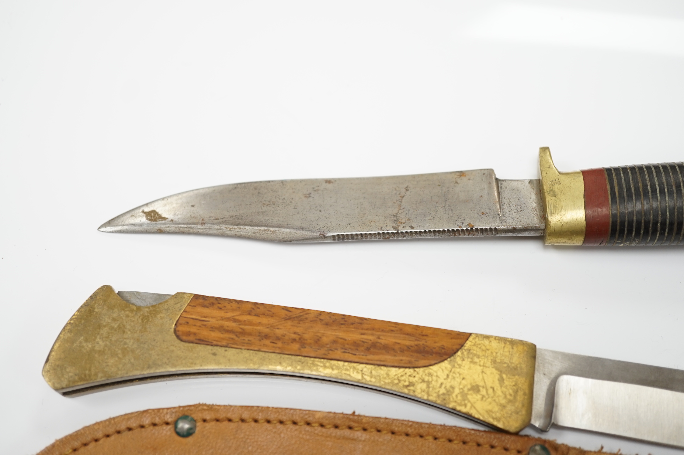 Two antler-handled hunting knives and three other knives